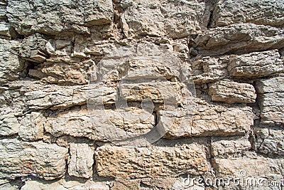 Ancient destroyed limestone wall Stock Photo