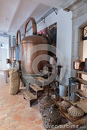 Ancient distiller for the production of perfume in Fragonard factory in Grasse, France Editorial Stock Photo