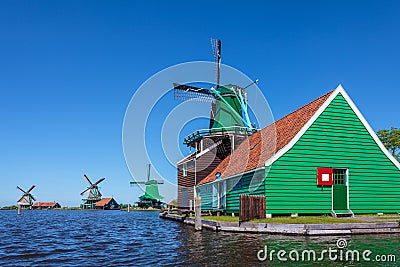 Ancient Dutch wooden windmills at the Zaanse Schans Stock Photo