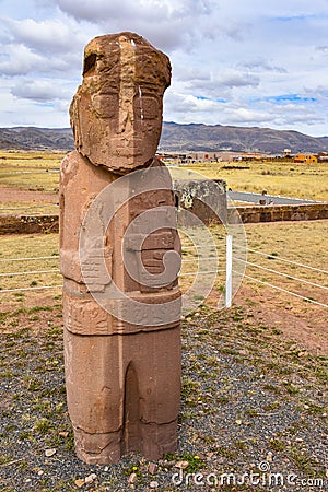 The ancient `El Fraile` monolith at the Tiwanaku archeological site, near La Paz, Bolivia Editorial Stock Photo
