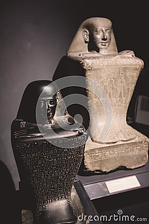 Ancient Exhibits in the Alexandria National Museum - Marble and Stone Statues, Books, Medieval Decoration and Roman Tableware Editorial Stock Photo