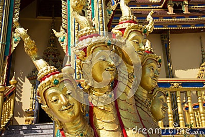 Ancient face of human on naga of Himmapan animal creature of Himavanta legendary forest on stair of ubosot ordination hall for Stock Photo