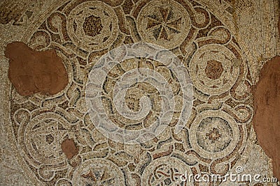 Ancient floor Byzantine mosaic from roman ruins at Umm Qais, ancient town of Gadara, Jordan Stock Photo