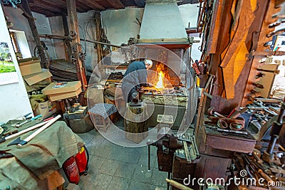 Ancient forge in the ethnographic complex `Etera` in Bulgaria Editorial Stock Photo
