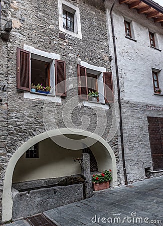 Ancient fountain in the medieval village of Bard in Valle D`Aosta Stock Photo