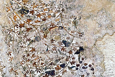 Ancient Fragmented Traditional Nabataean Ceiling Fresco Paintings in the Small Biclinium in Little Petra, Jordan Stock Photo