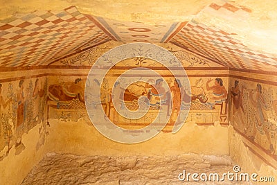 Ancient frescoes decorating etruscan tomb in Italy Stock Photo