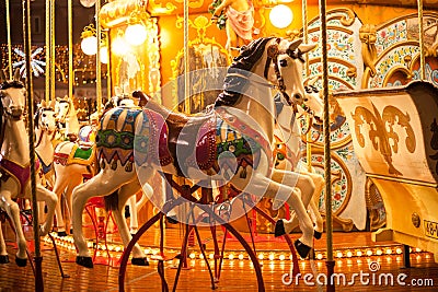 Ancient German Horse Carousel built in 1896 in Navona Square, Rome, Italy Stock Photo