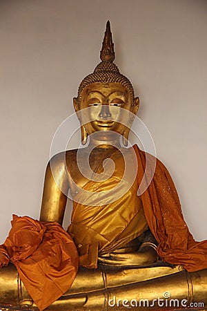 Old Golden Buddhas With Smiling Face Stock Photo