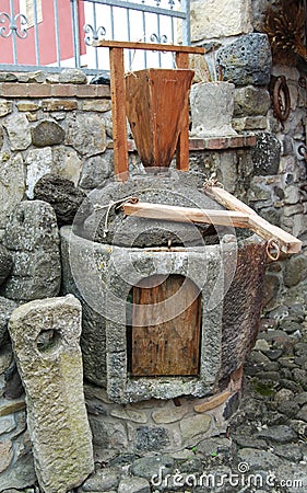 Ancient grain hand grinding millstones Stock Photo