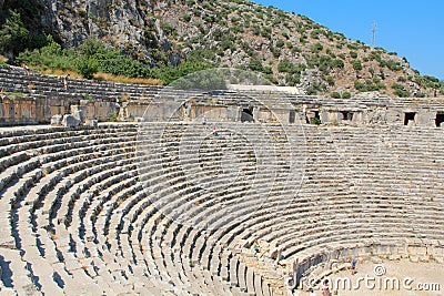 Ancient Greek-Roman amphitheatre in Myra, old name - Demre, Turkey. Myra is an antique town in Lycia where the small town of Kale Stock Photo