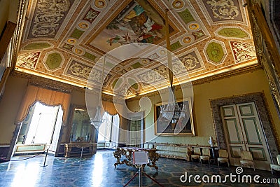Ancient hall inside the Royal Palace of Caserta. Ceiling with ancient historical paintings and decorations Editorial Stock Photo