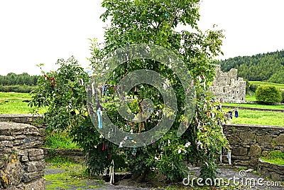 Ancient holy well and remembrances Stock Photo