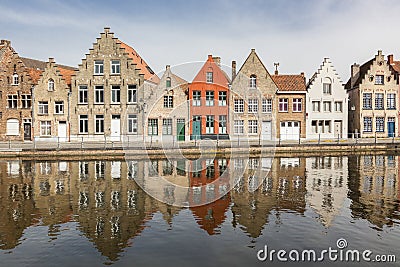 Ancient houses along a canal in Bruges Stock Photo