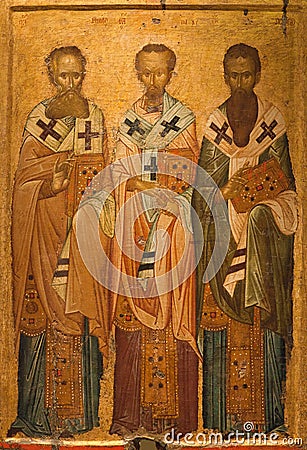 Ancient icon of The Three Hierarchs - Basil the Great, Gregory the Theologian and John Chrysostom. Thessaloniki, Greece Stock Photo
