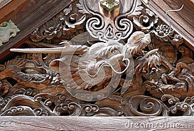 Ancient Japanese Wood Carving Sacred Dragon Head at Mount Koya Stock Photo