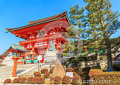 Ancient japanese wood gate and garden with blue sky, Kyoto, Japan Stock Photo