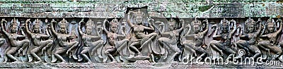 Ancient Khmer Laterite Stone Carving of Female Dancers Stock Photo