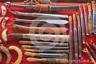 Ancient knives and Thai Amulets & Talismans Stock Photo