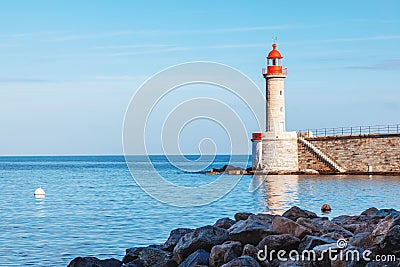 Ancient lighthouse in Bastia, Corsica, France. Beautiful sea lan Stock Photo