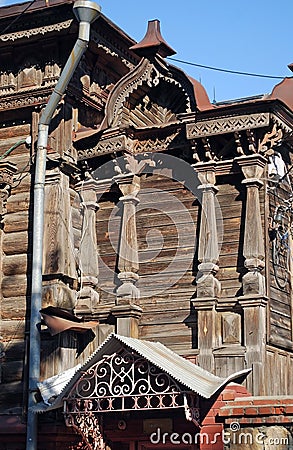 The ancient lordly inhabited wooden house on Karl Marx Street in the city of Syzran. Summer city landscape. Samara region. Stock Photo