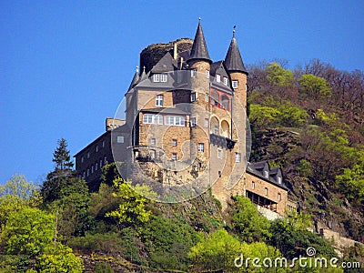 Ancient medieval castle on a mountain against a blue sky, Germany, castles on the banks of the Rhine Stock Photo