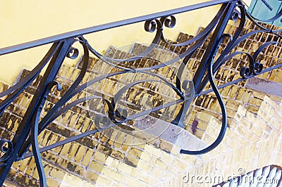 Ancient metal stair handrails Stock Photo