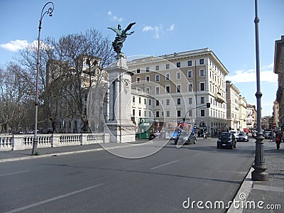 Ancient and modern buildings, statues from the Roman Empire period, street and cars in the city of Rome Editorial Stock Photo