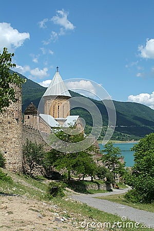 Ancient monastery near lake, Georgia Stock Photo