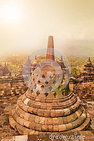 Ancient monument of Borobudur Buddhist temple at sunrise, Yogyakarta, Java Indonesia. Stock Photo