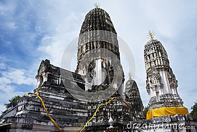 Ancient Na Phra That stupa and ruins chedi prang of Wat Mahathat Worawihan temple for thai people travelers visit and respect Stock Photo