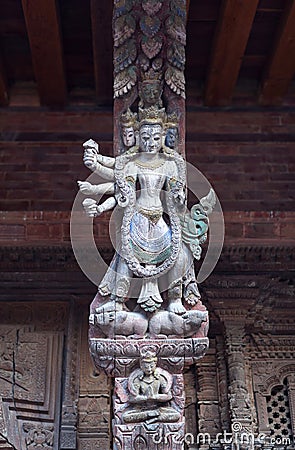 Ancient Nepalese wooden carving with hindu gods in Patan, Nepal Stock Photo