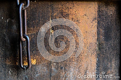 Ancient old chain concept on old door, wallpaper, background Stock Photo
