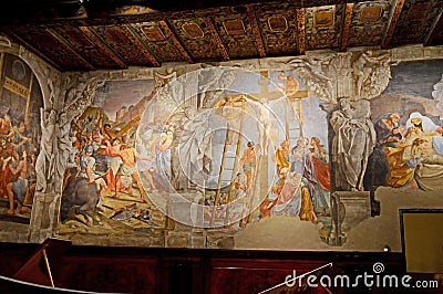 Ancient painting of jesus on the cross at the San Colombano Church Bologna Italy Editorial Stock Photo