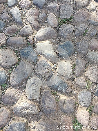 Ancient pavement, stone, granite, cobblestones, monastery. Stock Photo