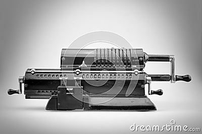 Ancient pinwheel mechanical calculator.Black and white shot Stock Photo