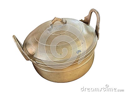 Ancient pot made of brass. There is a pattern on the handle area. isolated white background Stock Photo