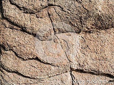 Ancient Precambrian rock illuminated by direct sunlight Stock Photo