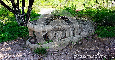 Ancient prehispanic crocodile made of stone Stock Photo