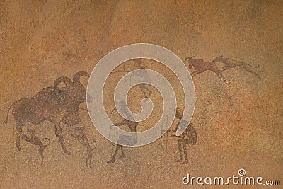 Ancient primitive drawings on cave walls Stock Photo