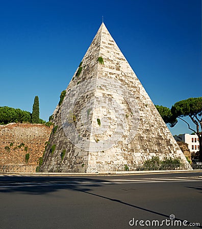 The ancient Pyramid of Cestius in Rome Stock Photo