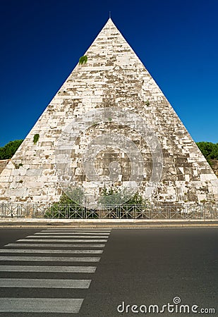 The ancient Pyramid of Cestius in Rome Stock Photo