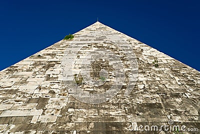 The ancient Pyramid of Cestius in Rome Stock Photo