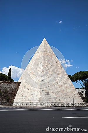 The ancient Pyramid of Cestius in Rome Stock Photo