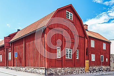 Ancient red wooden house in Karlskrona, Sweden Stock Photo