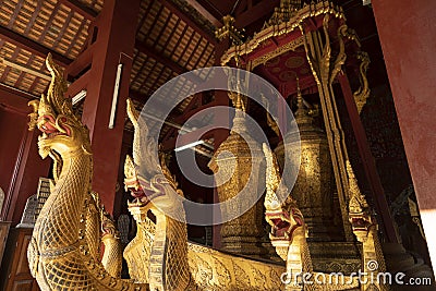 Nagas snakes in a ceremonial barge, Wat Xieng Thong, in Luang Prabang, Laos Editorial Stock Photo