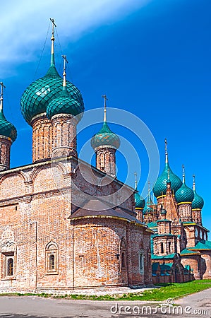 Ancient repairing church of red brick in sunny day Stock Photo