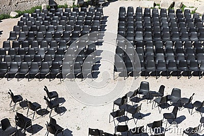 Ancient Roman amphitheater with modern armchairs Stock Photo