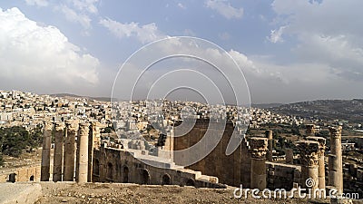 Ancient Roman city of Gerasa against the background of the modern city of Jarash. preset-day Jerash, Stock Photo