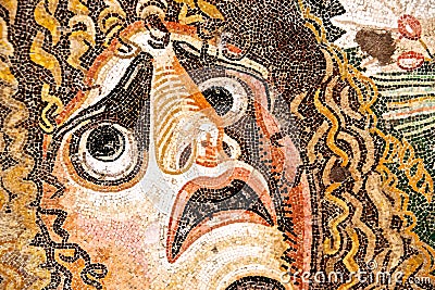 Ancient roman mosaic with fearful face Editorial Stock Photo
